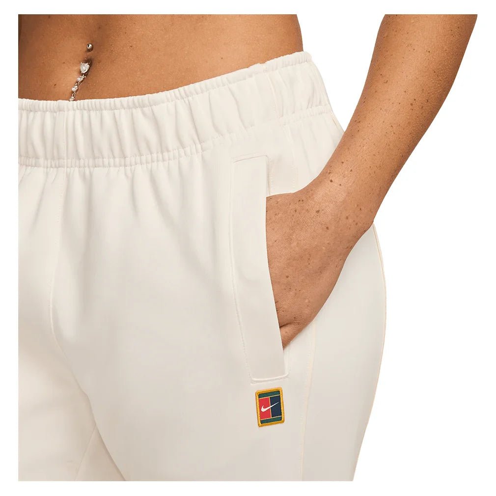 Women's Court Dri - FIT Heritage Windrunner Poly Knit Pant Pale Ivory - Bell Racket Store